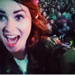 My 14 year old Lydia on her dads shoulders at Mumford and sons....Her face sums up that Glastonbury feeling