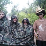 3 people - 1 poncho and daddy cool on the end