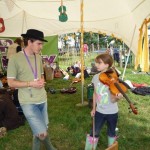 Olivia leen age 9 gets a free violin lesson in the kids field ..
