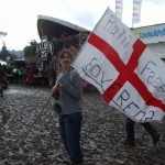 Leonie with her flag in the rain at the Pyramid field in 2007