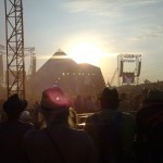 Sun setting over the Pyramid Stage as Dizzee Rascal sends the crowd 'Bonkers!'
