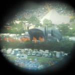 The Other Stage and the back of the Pyramid Stage seen through the telescope at the top of the Ribbon Tower