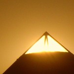 sunset after pendulum behind pyramid