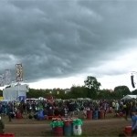 Sun Ra Arkestra on West Holts with the storm that paused Glastonbury looming above. (3) 
