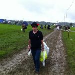 Making our way into Glastonbury 2011 Wednesday morning, bit of rain and mud.