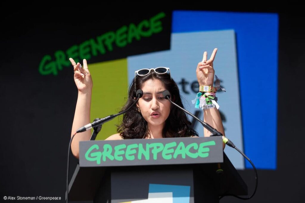 Actress Ambika Mod Letters Live on the Greenpeace Stage at Glastonbury 2025.
