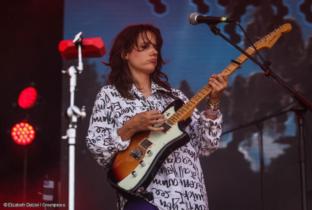 Anna Erhard on the Greenpeace Stage at Glastonbury 2025