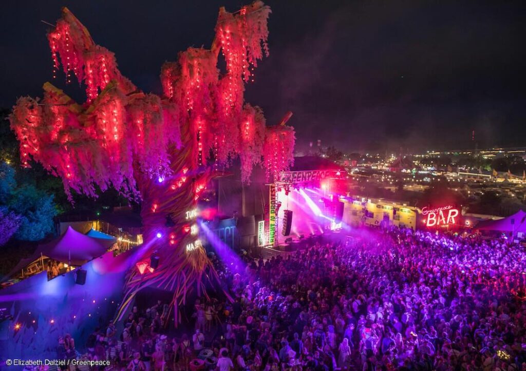 The Greenpeace Field at night. Glastonbury 2025
